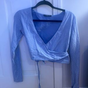 A long sleeve floral wrap top